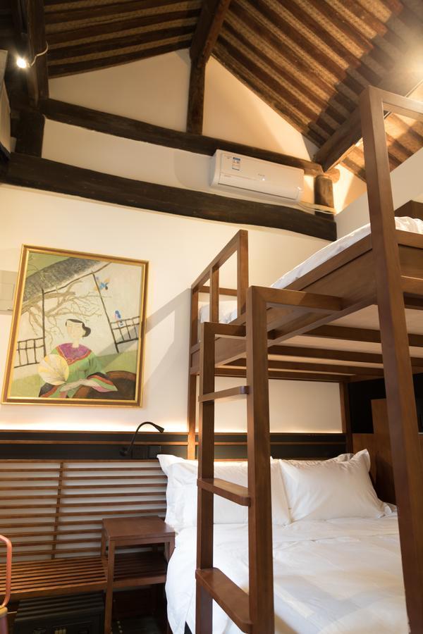Courtyard Guesthouse, Пекин Экстерьер фото